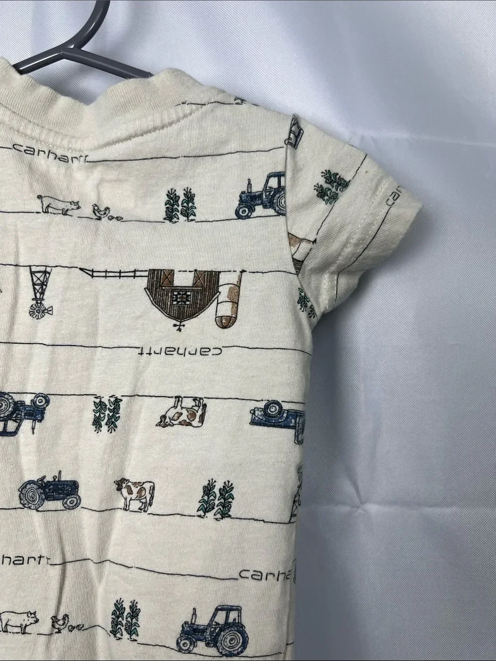 Carhartt tan farm print one piece Henley pocket tee. Size 6 months